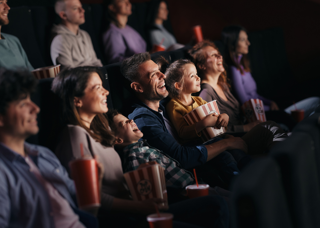 People watching movie in cinema