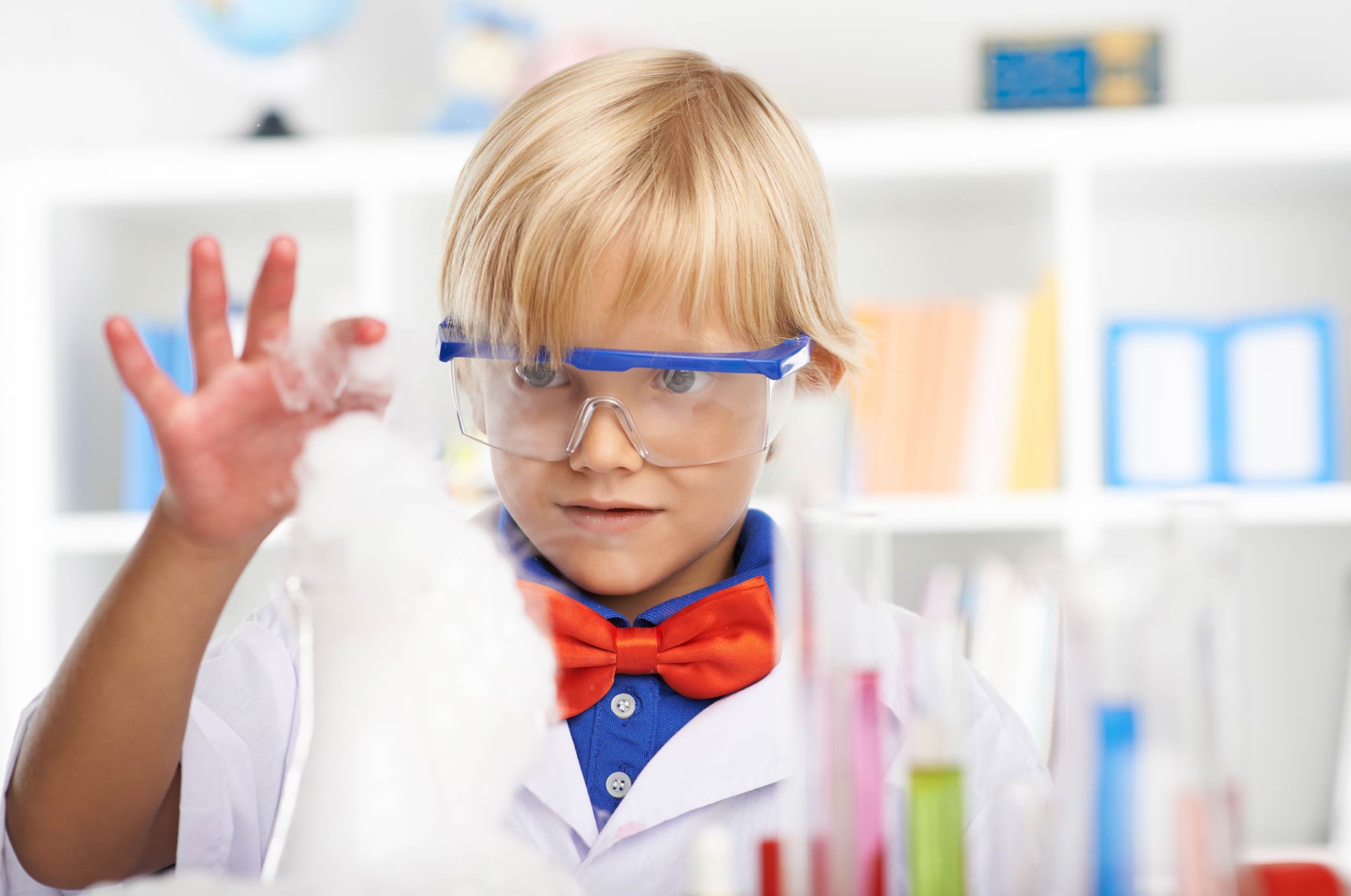 kid doing science experiment