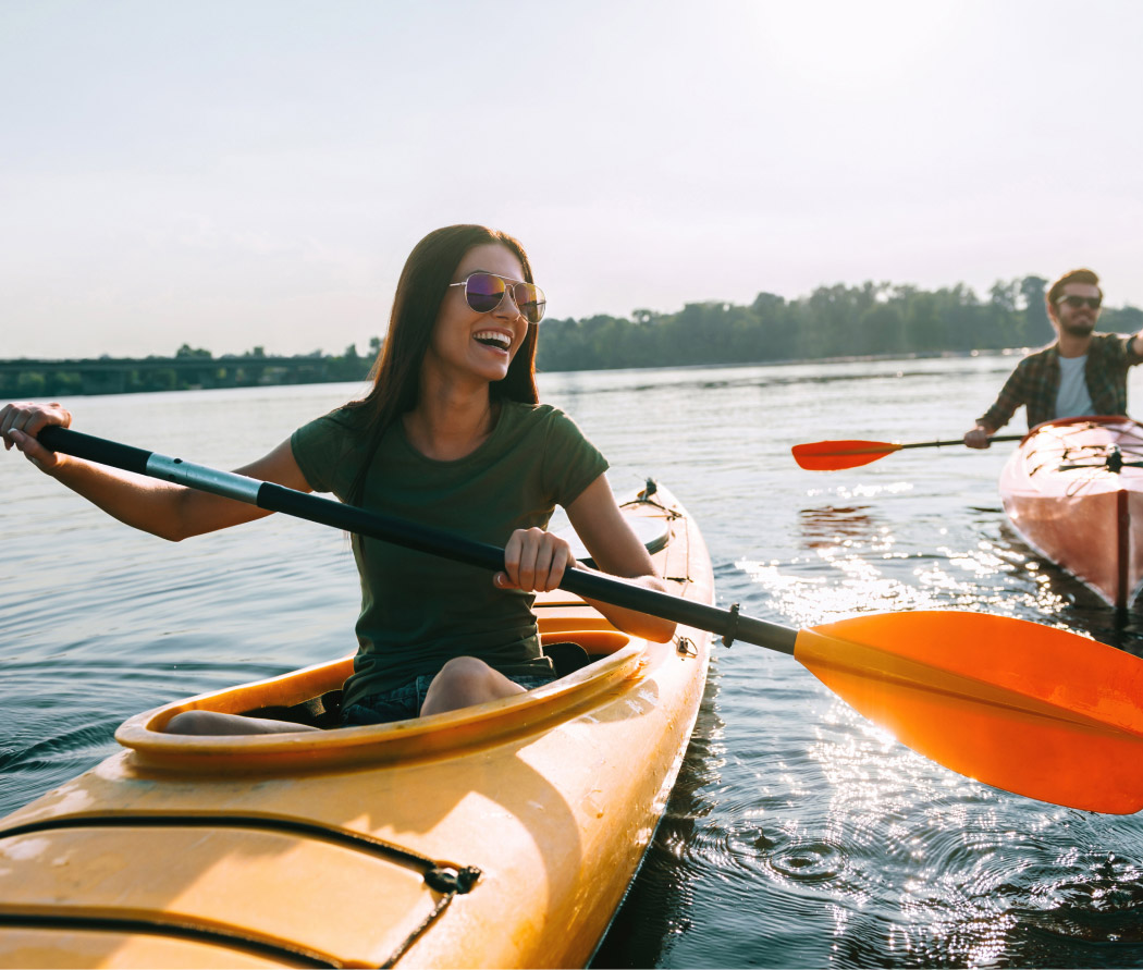 couple kayaking on a lake