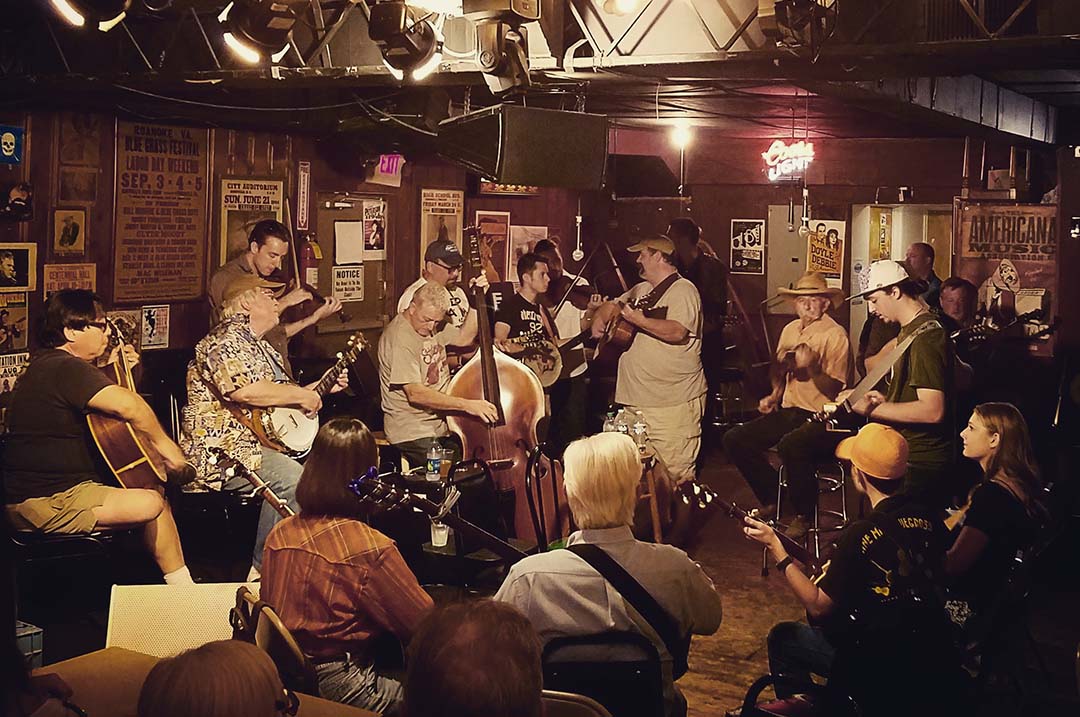 Image of a group playing at the Station Inn in Nashville, there are so many things to do in a new city.