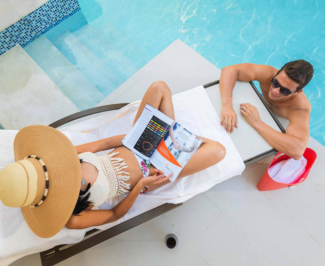Emotions All Inclusive Juan Dolio, Ascend Hotel Collection couple relaxing at pool