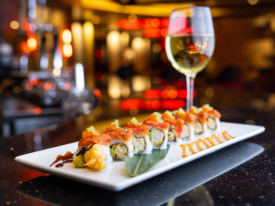sushi roll and wine