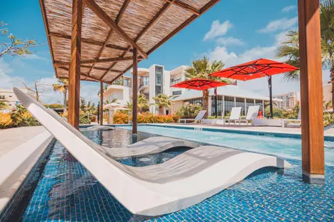 Adult WhirlPool/Courtyard Loungers | Radisson Blu, Palm-beach AW-S Hotels