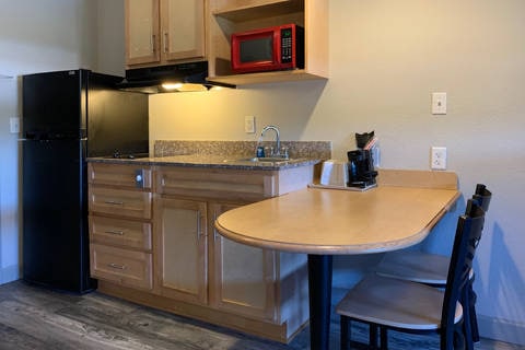 Guest room with kitchen area | Suburban, Panama-city FL Hotels