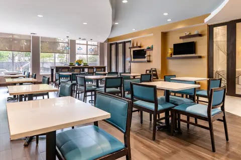 Enjoy breakfast in this seating area | Comfort Suites, Dania-beach FL Hotels