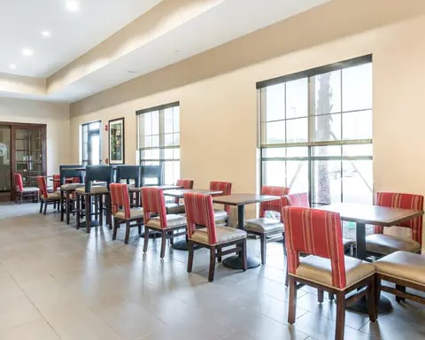 Breakfast area in the lobby | Comfort Inn Suites Hotel in Dunnellon, FL
