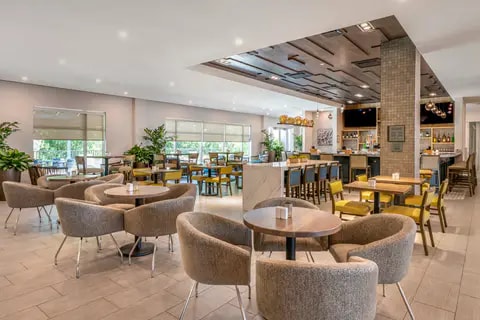 Dining room | Cambria, Orlando FL Hotels