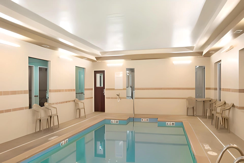 Indoor pool | RocketFuel, Le-roy IL Hotels