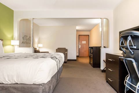 Guest room with sitting area | Sleep Inn, Columbus IN Hotels