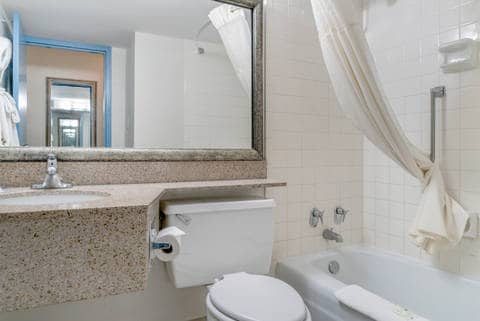 Bathroom in guest room | Quality Inn, Livonia MI Hotels