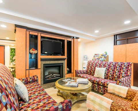 Relax by the fireplace in the lobby | Comfort Inn, Ashland NH Hotels