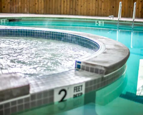 Indoor pool with hot tub | Rodeway Inn, Lake-placid NY Hotels