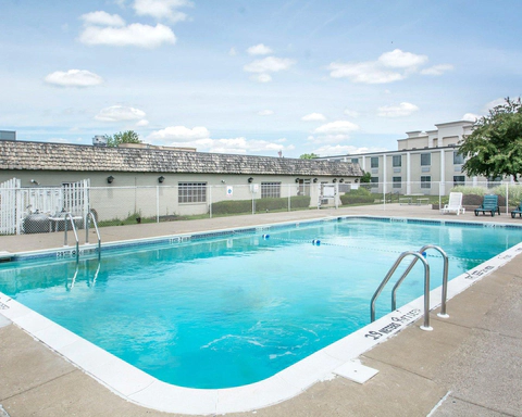 Outdoor pool with sundeck | Quality Inn hotel in Geneseo, NY