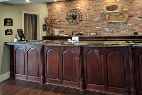 Front desk with friendly staff | Ascend Hotel Collection, Latham NY Hotels