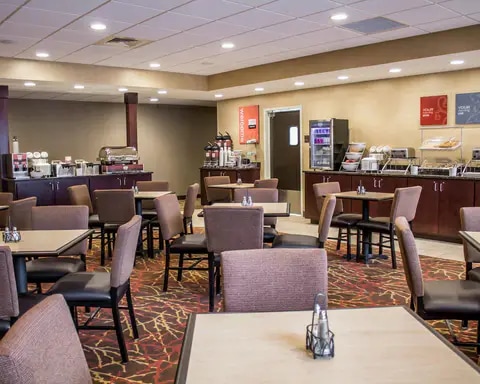 Enjoy breakfast in this spacious area | Comfort Inn and Suites | Wadsworth, OH