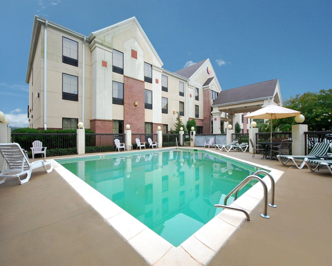 Outdoor pool with sundeck | Comfort Inn and Suites | Spartanburg, SC