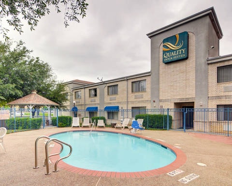 Outdoor pool with sundeck | Quality Inn and Suites, Grand Prairie TX Hotels