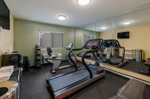 Exercise room with cardio equipment | Quality Inn, Denton TX Hotels