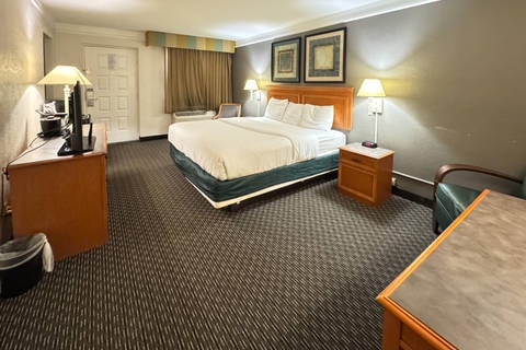 Guest room with king bed(s) | Rodeway Inn - Hotel in College Station, TX