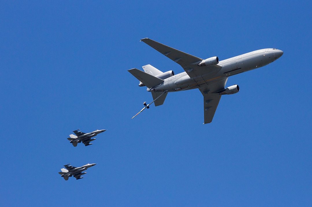 A KC-135 Stratotanker refuels an F-16 fighter during one of the best air shows in the U.S.