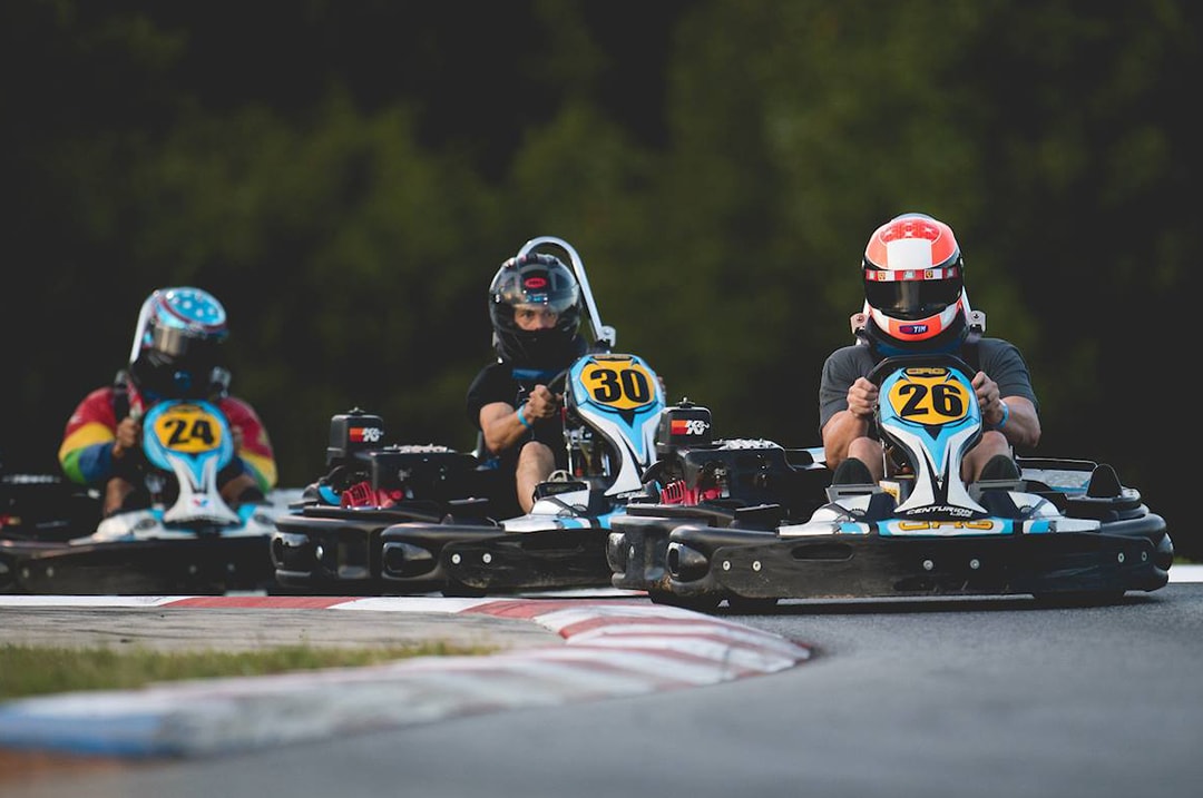 Line of go-karts racing on a track just like NASCAR in Charlotte